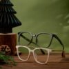 Eco-friendly eyewear on wooden table with a sustainable aesthetic.