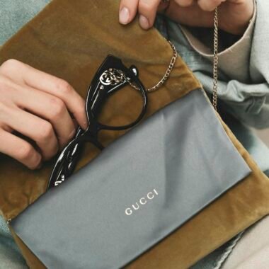 Gucci glasses in a stylish case, embodying luxury and fashion.
